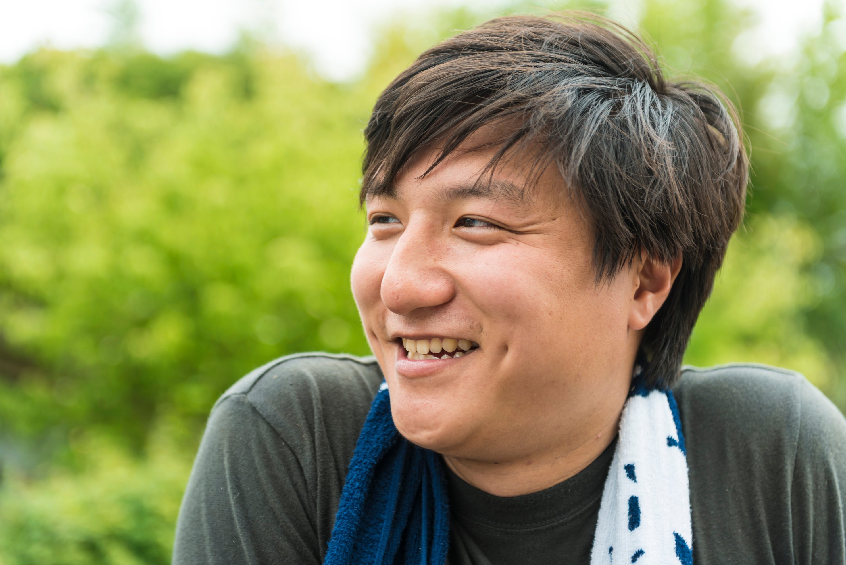 Young Japanese male smiling